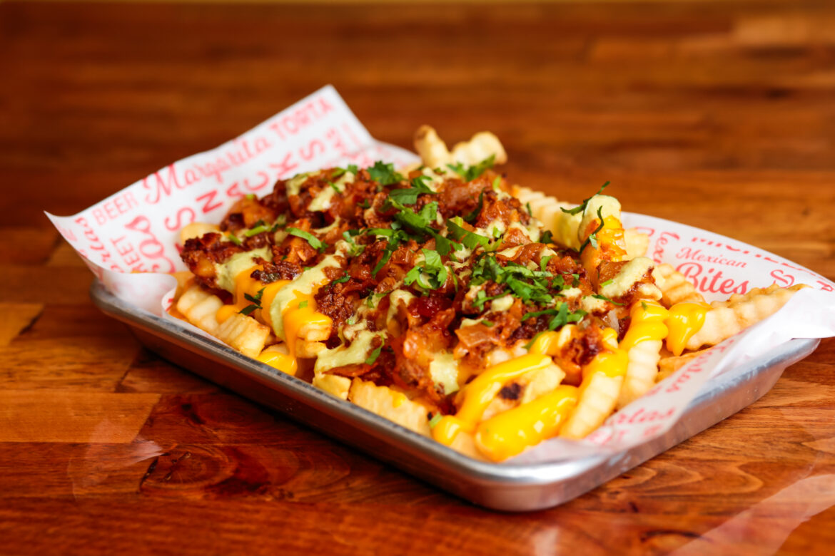 Mexi-fries with Chorizo at Gaspachos. Photo by Marco Torres.